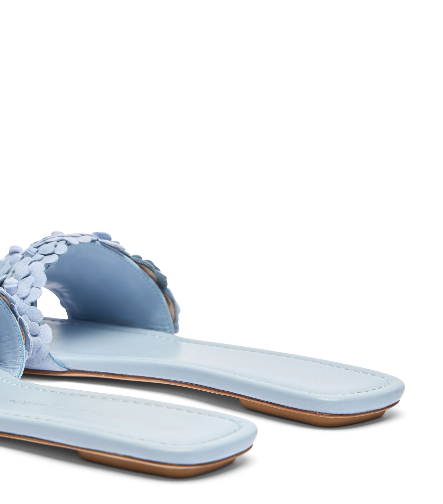 サンダル・ミュール Stuart Weitzman MEADOWFLATSLIDE Sandals Ciabatta Bianca Con MEADOW SLIDE in CIELO for Women | Stuart Weitzman®